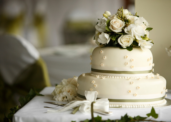 white wedding cake with flowers